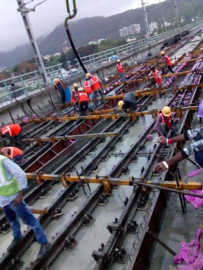Ballastless track work in progress on an elevated metro viaduct